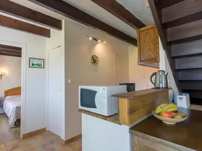 Cuisine ou kitchenette dans l'établissement Holiday Home Blaue Hortensie by Interhome