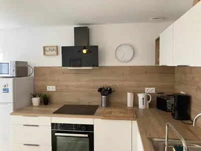Cuisine ou kitchenette dans l'établissement Gite ty hent houarn