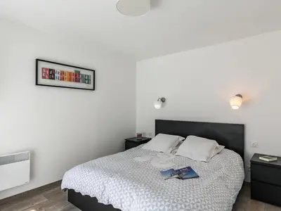 Un ou plusieurs lits dans un hébergement de l'établissement Holiday Home Le Triskell by Interhome