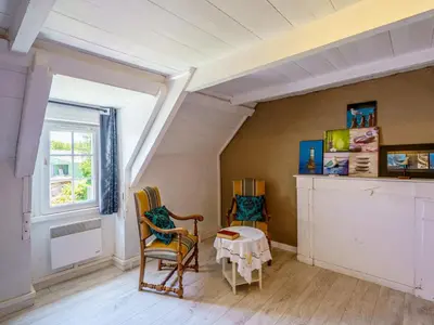 Coin salon dans l'établissement Holiday Home Ty Jos by Interhome
