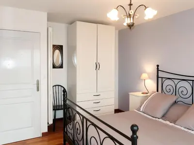 Un ou plusieurs lits dans un hébergement de l'établissement Apartment Belle vue sur mer by Interhome