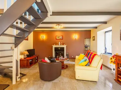 Coin salon dans l'établissement Holiday Home Du Bout du Monde by Interhome