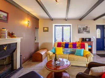 Coin salon dans l'établissement Holiday Home Du Bout du Monde by Interhome