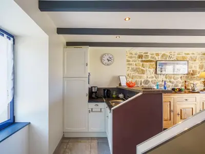 Cuisine ou kitchenette dans l'établissement Holiday Home Du Bout du Monde by Interhome