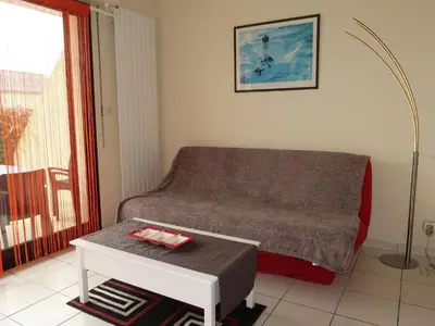 Coin salon dans l'établissement Apartment Fakarava by Interhome