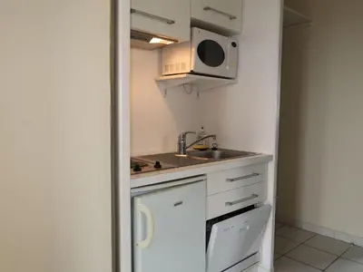 Cuisine ou kitchenette dans l'établissement Apartment Fakarava by Interhome