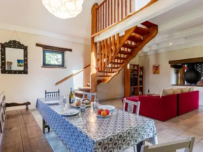 Coin salon dans l'établissement Holiday Home Les Trois Baudets by Interhome