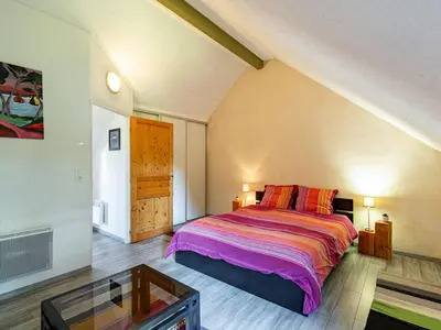 Un ou plusieurs lits dans un hébergement de l'établissement Holiday Home Les Trois Baudets by Interhome