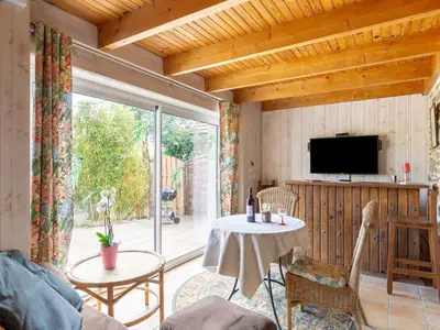 Télévision ou salle de divertissement dans l'établissement Holiday Home Les Bambous by Interhome