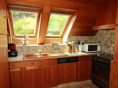 Cuisine ou kitchenette dans l'établissement Holiday Home Ty Coz by Interhome
