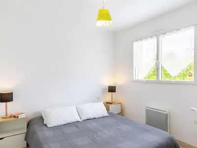 Un ou plusieurs lits dans un hébergement de l'établissement Holiday Home Ty Fañch by Interhome