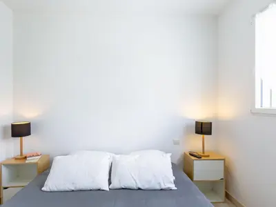 Un ou plusieurs lits dans un hébergement de l'établissement Holiday Home Ty Fañch by Interhome