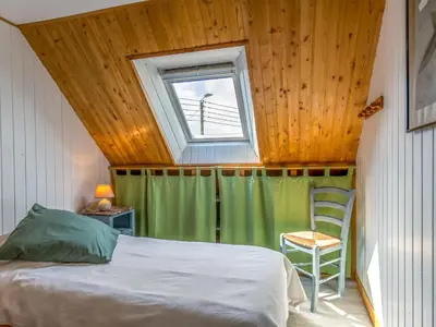 Un ou plusieurs lits dans un hébergement de l'établissement Holiday Home Bleue by Interhome