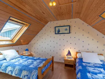 Un ou plusieurs lits dans un hébergement de l'établissement Holiday Home Ty Channed by Interhome