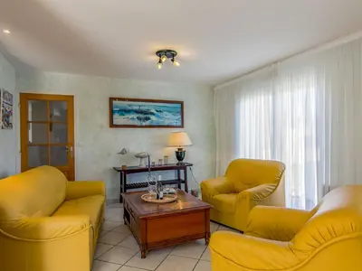Coin salon dans l'établissement Holiday Home L'Hermine by Interhome