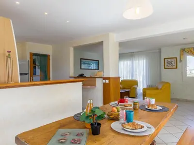 Coin salon dans l'établissement Holiday Home L'Hermine by Interhome