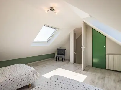 Un ou plusieurs lits dans un hébergement de l'établissement Holiday Home Ty Angèle by Interhome