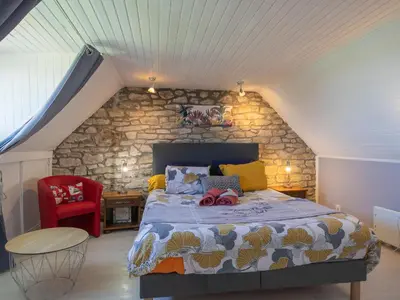 Un ou plusieurs lits dans un hébergement de l'établissement Holiday Home La Grande Roche by Interhome