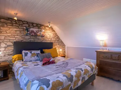 Un ou plusieurs lits dans un hébergement de l'établissement Holiday Home La Grande Roche by Interhome