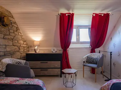 Un ou plusieurs lits dans un hébergement de l'établissement Holiday Home La Grande Roche by Interhome