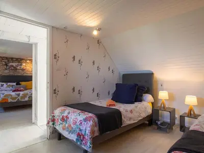 Un ou plusieurs lits dans un hébergement de l'établissement Holiday Home La Grande Roche by Interhome