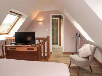 Télévision ou salle de divertissement dans l'établissement Holiday Home L'Hirondelle by Interhome