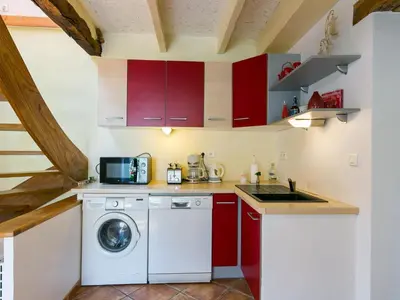 Cuisine ou kitchenette dans l'établissement Holiday Home L'Hirondelle by Interhome