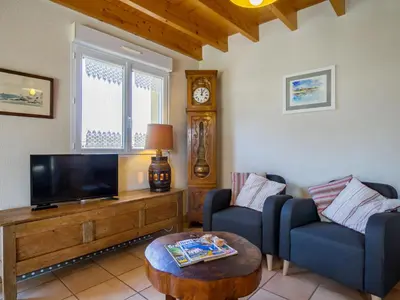 Télévision ou salle de divertissement dans l'établissement Holiday Home Rève de Plage by Interhome