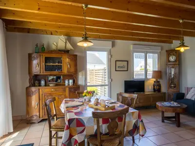 Coin salon dans l'établissement Holiday Home Rève de Plage by Interhome