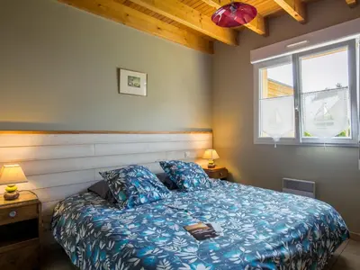 Un ou plusieurs lits dans un hébergement de l'établissement Holiday Home Rève de Plage by Interhome