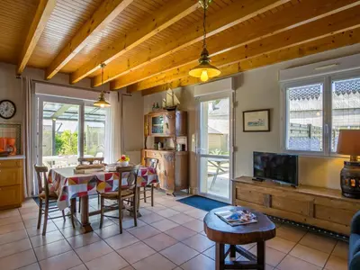Coin salon dans l'établissement Holiday Home Rève de Plage by Interhome