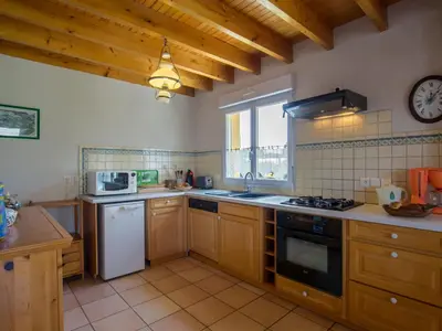 Cuisine ou kitchenette dans l'établissement Holiday Home Rève de Plage by Interhome