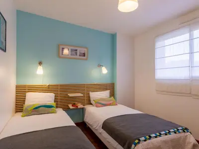 Un ou plusieurs lits dans un hébergement de l'établissement Holiday Home Maison de Plain Pied - Vue Mer by Interhome