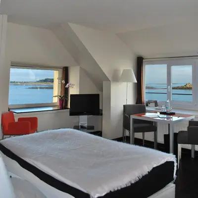 Un ou plusieurs lits dans un hébergement de l'établissement Hotel Le Temps De Vivre