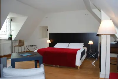 Un ou plusieurs lits dans un hébergement de l'établissement Hotel Le Temps De Vivre