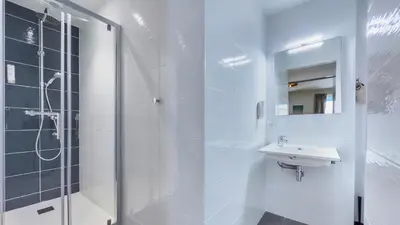 Salle de bains dans l'établissement Hotel De La Gare