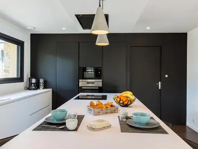 Cuisine ou kitchenette dans l'établissement Holiday Home Breizh Riviera by Interhome