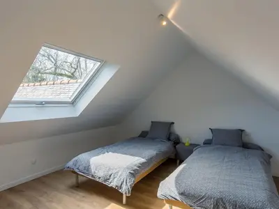 Un ou plusieurs lits dans un hébergement de l'établissement Holiday Home Breizh Riviera by Interhome