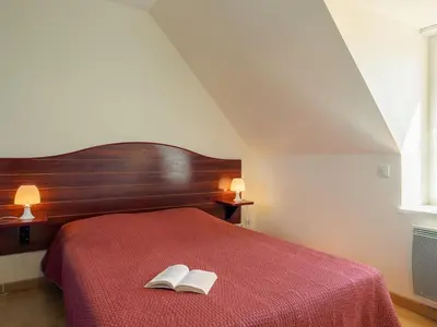 Un ou plusieurs lits dans un hébergement de l'établissement Holiday Home Ty Croisic by Interhome