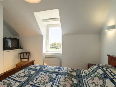 Un ou plusieurs lits dans un hébergement de l'établissement Holiday Home Ty Pors Ar Pagn by Interhome