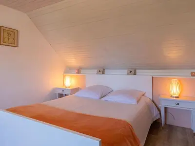 Un ou plusieurs lits dans un hébergement de l'établissement Holiday Home Les Hortensias by Interhome