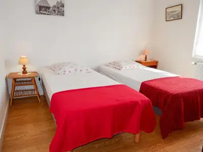 Un ou plusieurs lits dans un hébergement de l'établissement Holiday Home Les Genêts by Interhome