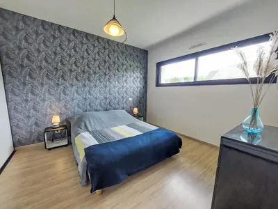 Un ou plusieurs lits dans un hébergement de l'établissement Holiday Home L'Iroise by Interhome