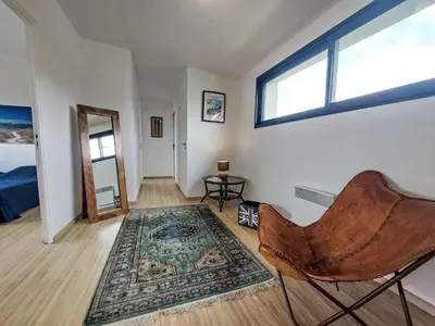 Coin salon dans l'établissement Holiday Home L'Iroise by Interhome