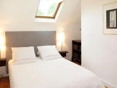 Un ou plusieurs lits dans un hébergement de l'établissement Holiday Home La Marinière by Interhome