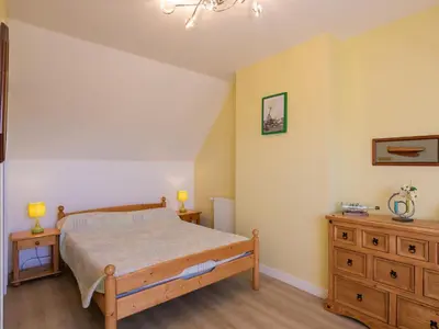 Un ou plusieurs lits dans un hébergement de l'établissement Holiday Home Blaues Meer by Interhome