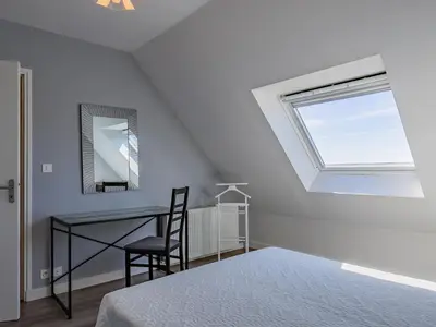 Un ou plusieurs lits dans un hébergement de l'établissement Holiday Home Blaues Meer by Interhome