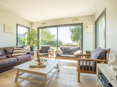 Coin salon dans l'établissement Holiday Home Hidel by Interhome