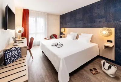 Un ou plusieurs lits dans un hébergement de l'établissement Hôtel L'Escale Marine Valdys Resort & SPA