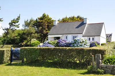 Jardin de l'établissement Maison de vacances au bord de la plage